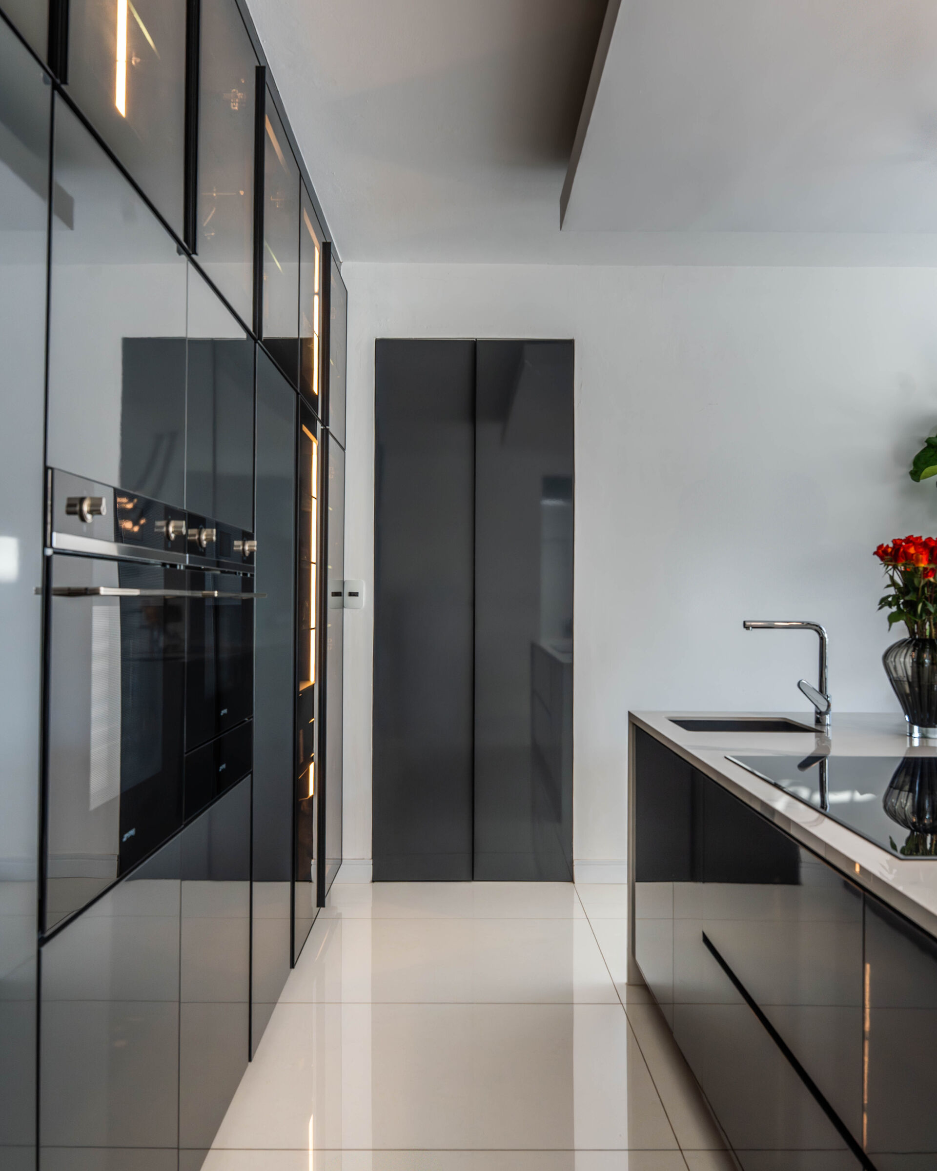 Hartbeespoort Residence — cooking run and glazed cabinetry, designed, manufactured and installed by The Kitchen Studio.