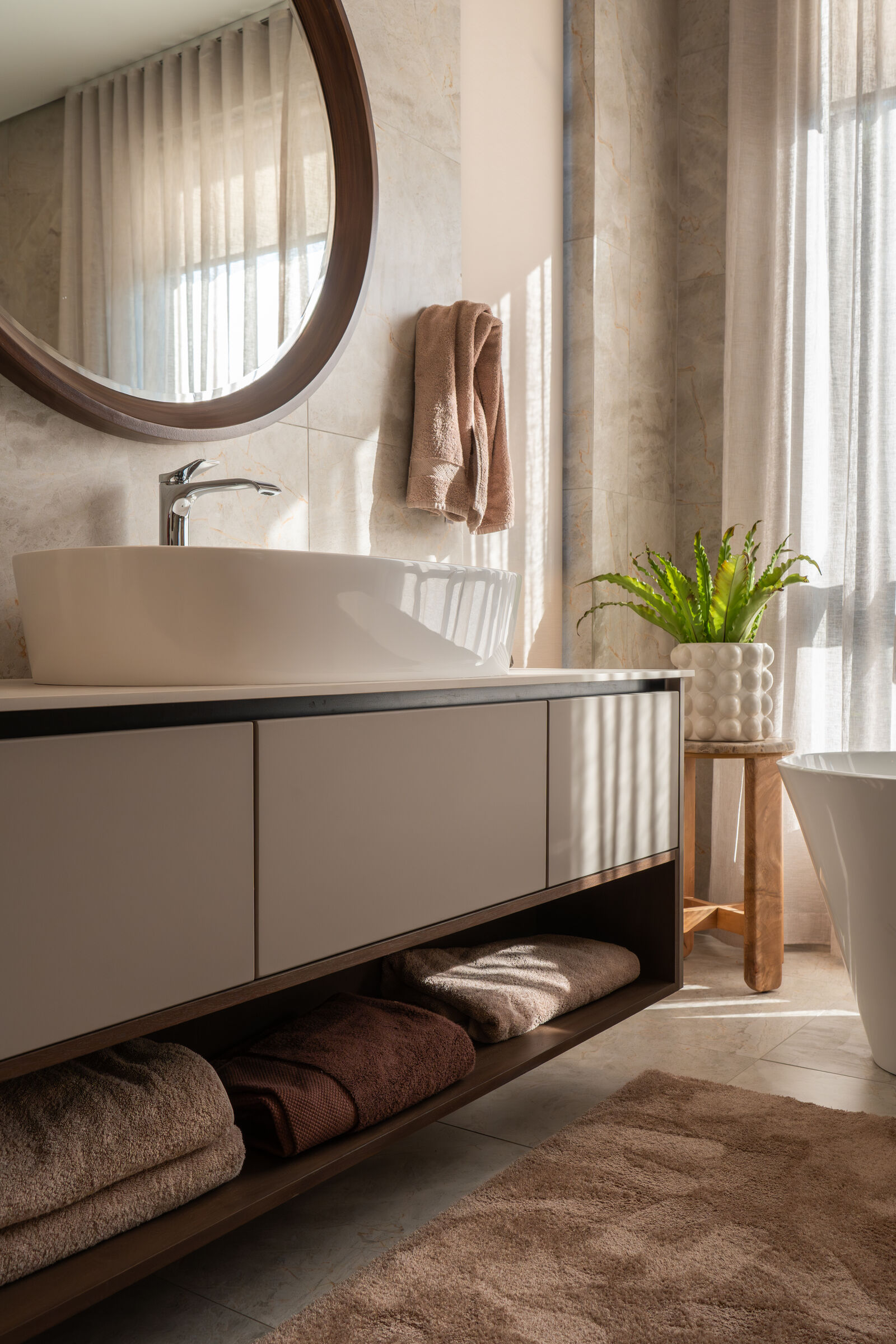 Westcliff Residence — vanity with stone basin, designed, manufactured and installed by The Kitchen Studio.