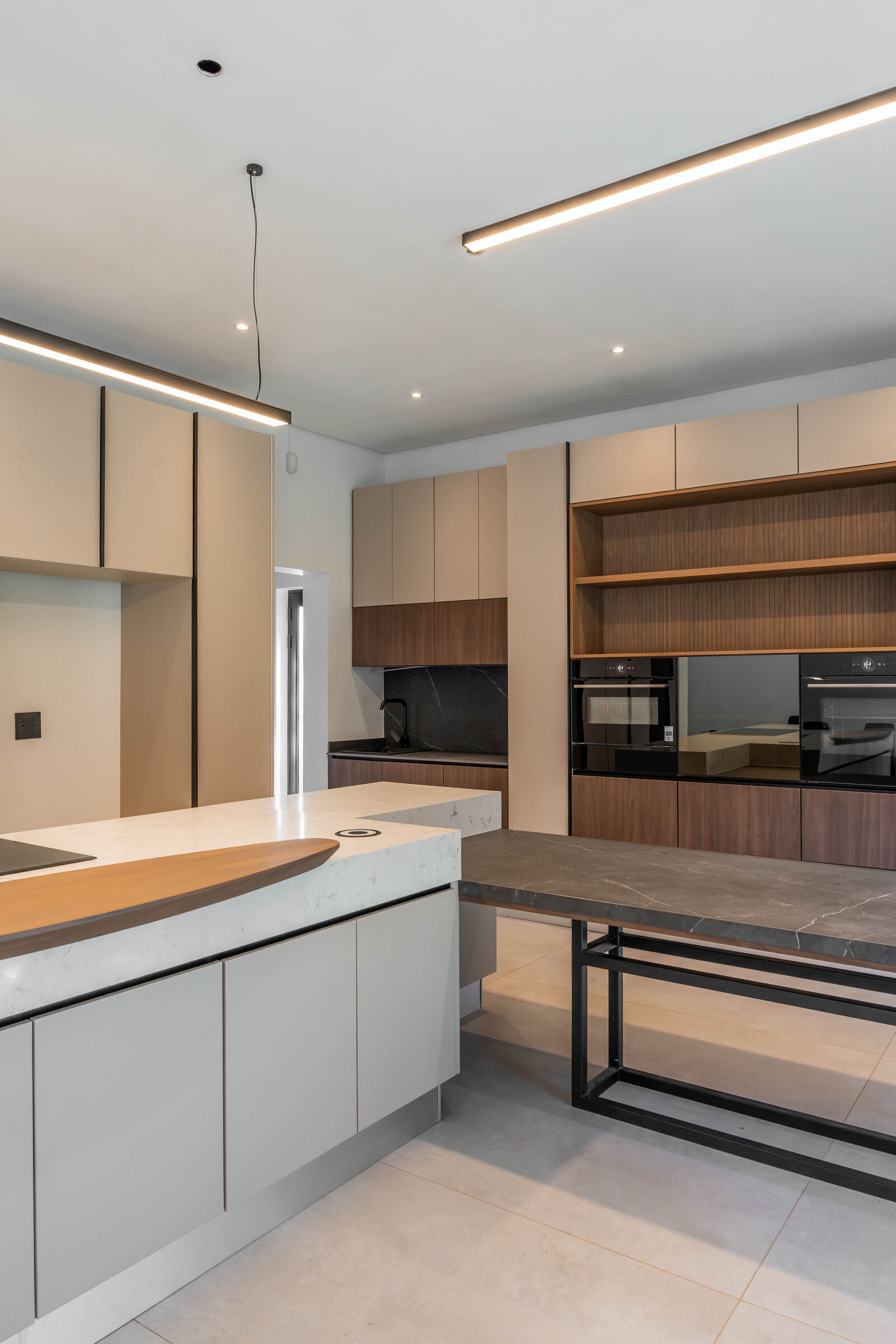 Greenside Residence — kitchen and scullery beyond, designed, manufactured and installed by The Kitchen Studio.