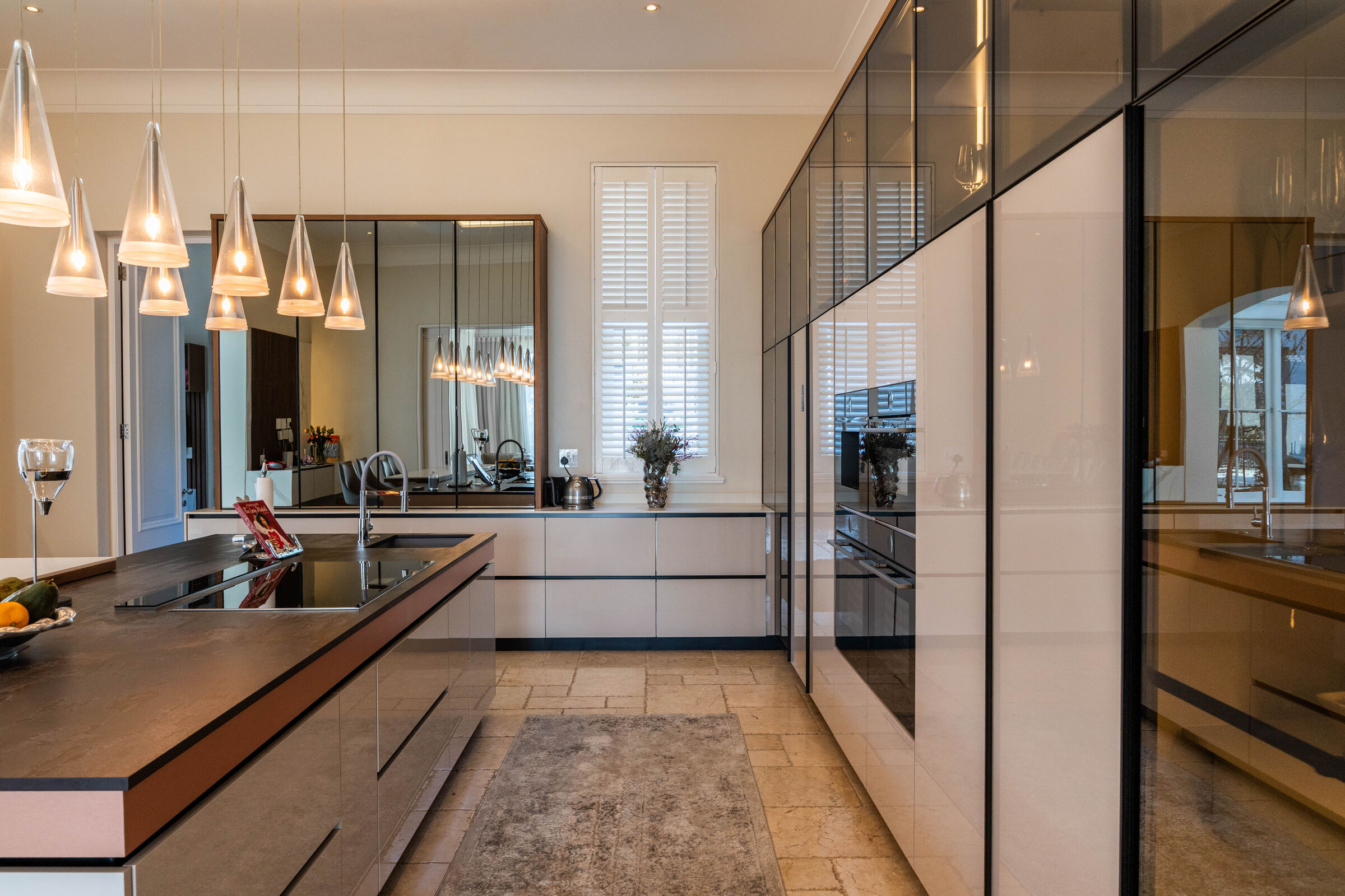 Sandhurst Residence — kitchen island with pendant lighting, designed, manufactured and installed by The Kitchen Studio.