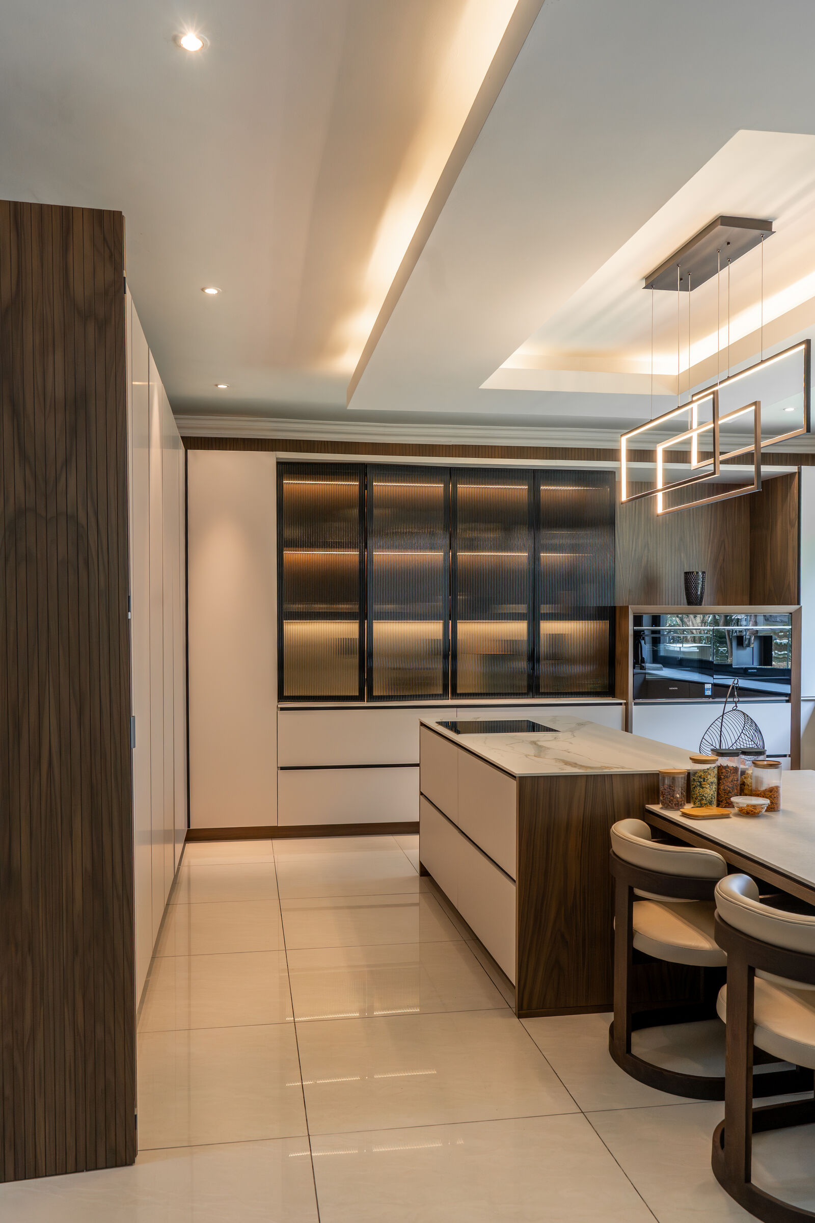Houghton Residence — kitchen with fitted seating, designed, manufactured and installed by The Kitchen Studio.