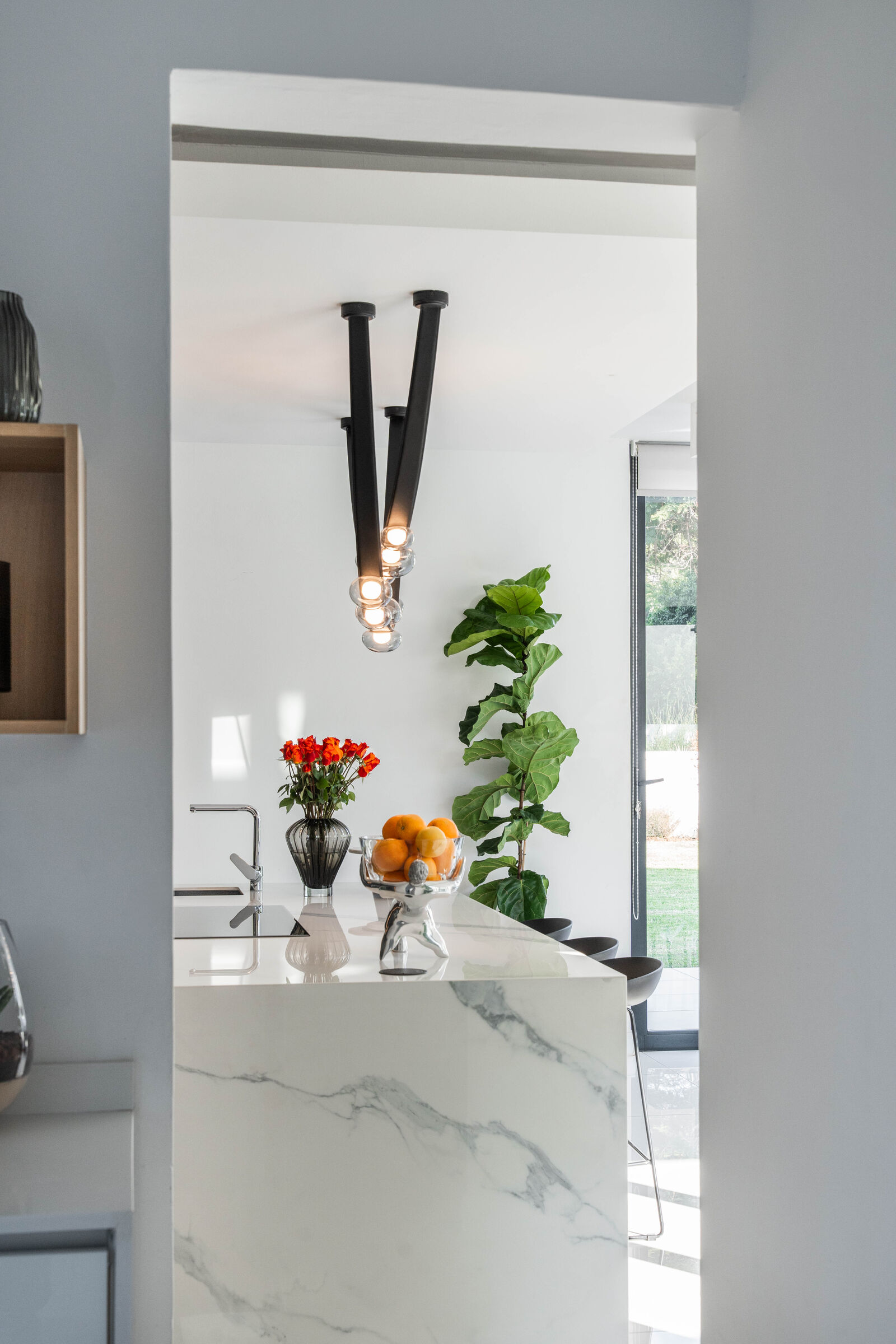 Hartbeespoort Residence — scullery with marble splashback, designed, manufactured and installed by The Kitchen Studio.