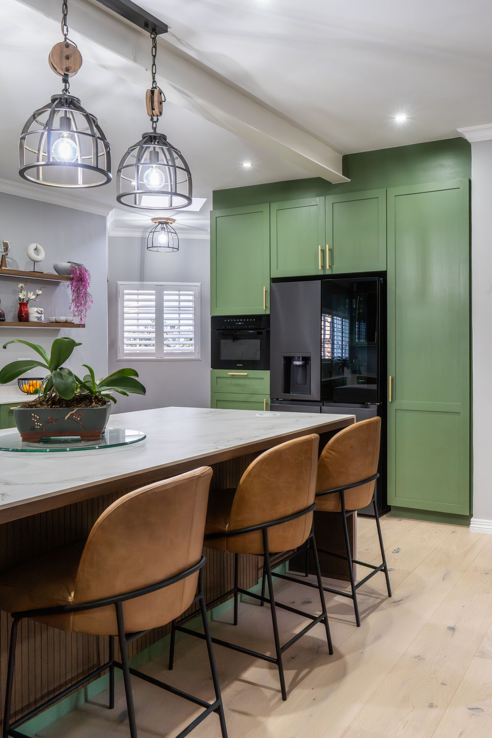 Bryanston Residence — kitchen island with bar seating, designed, manufactured and installed by The Kitchen Studio.