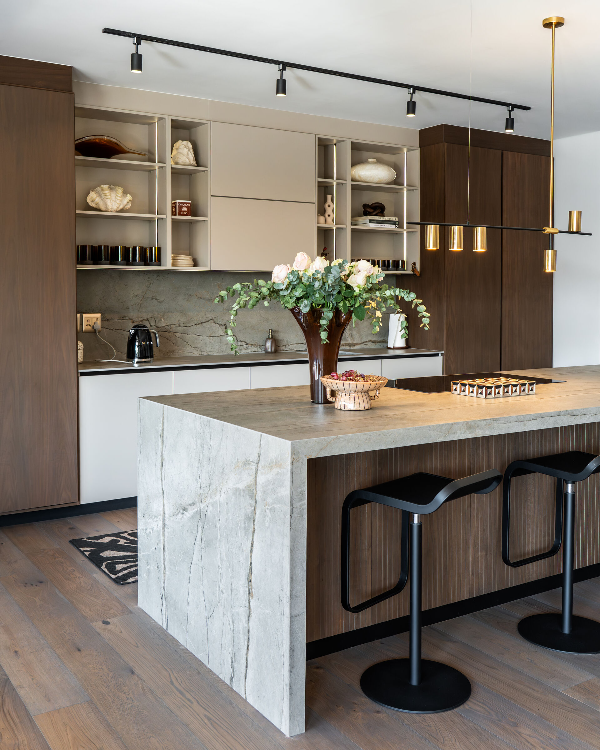 Westcliff Residence — kitchen island in pale stone, designed, manufactured and installed by The Kitchen Studio.