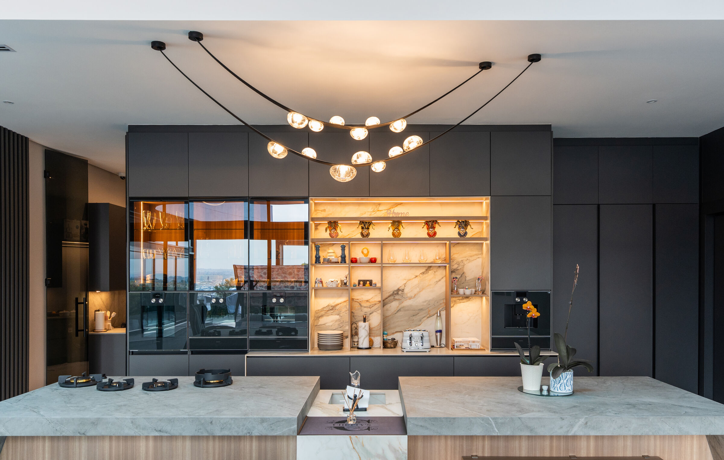 Steyn City Residence — kitchen and living space, designed, manufactured and installed by The Kitchen Studio.