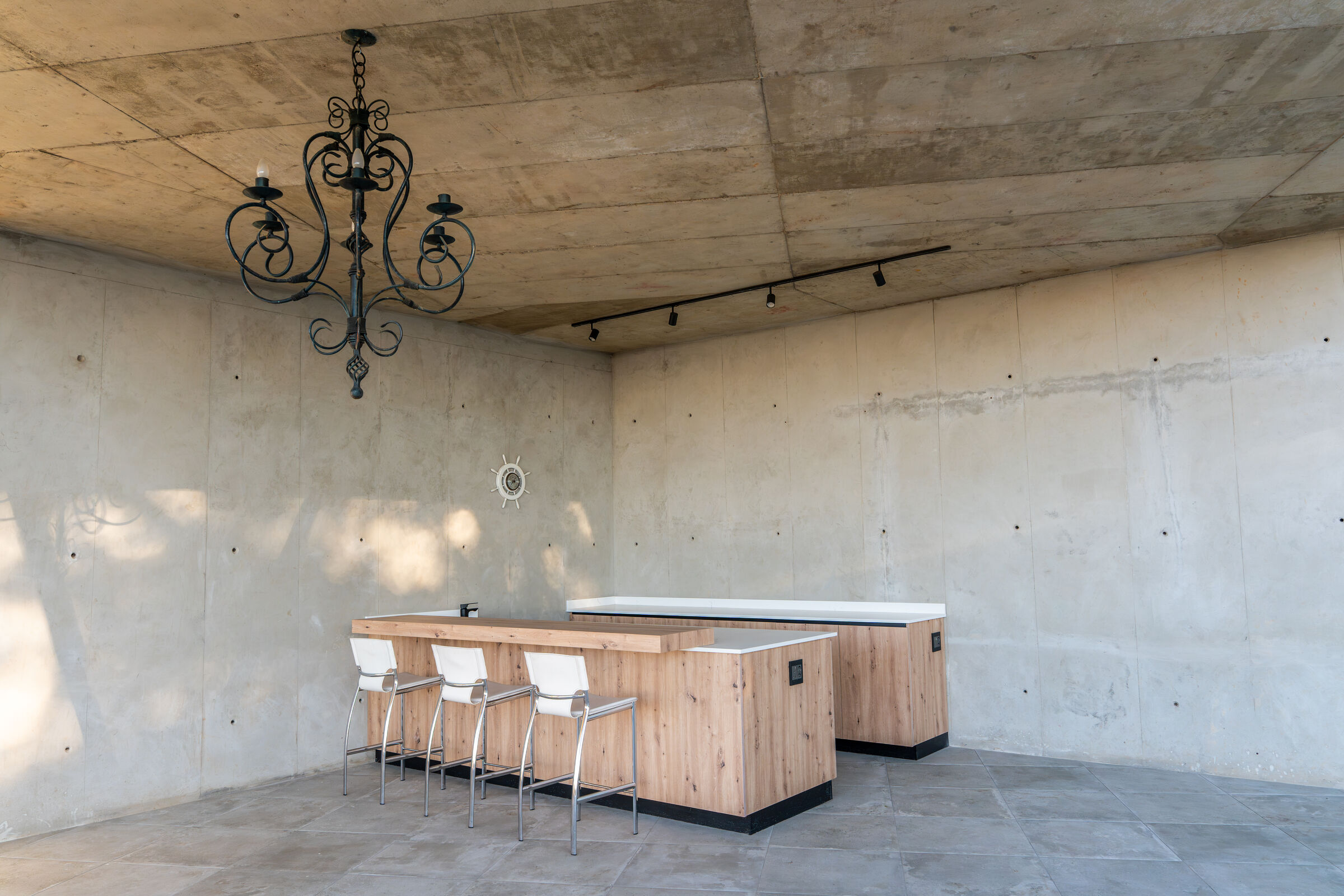Northcliff Residence — bar with stone-topped island, designed, manufactured and installed by The Kitchen Studio.