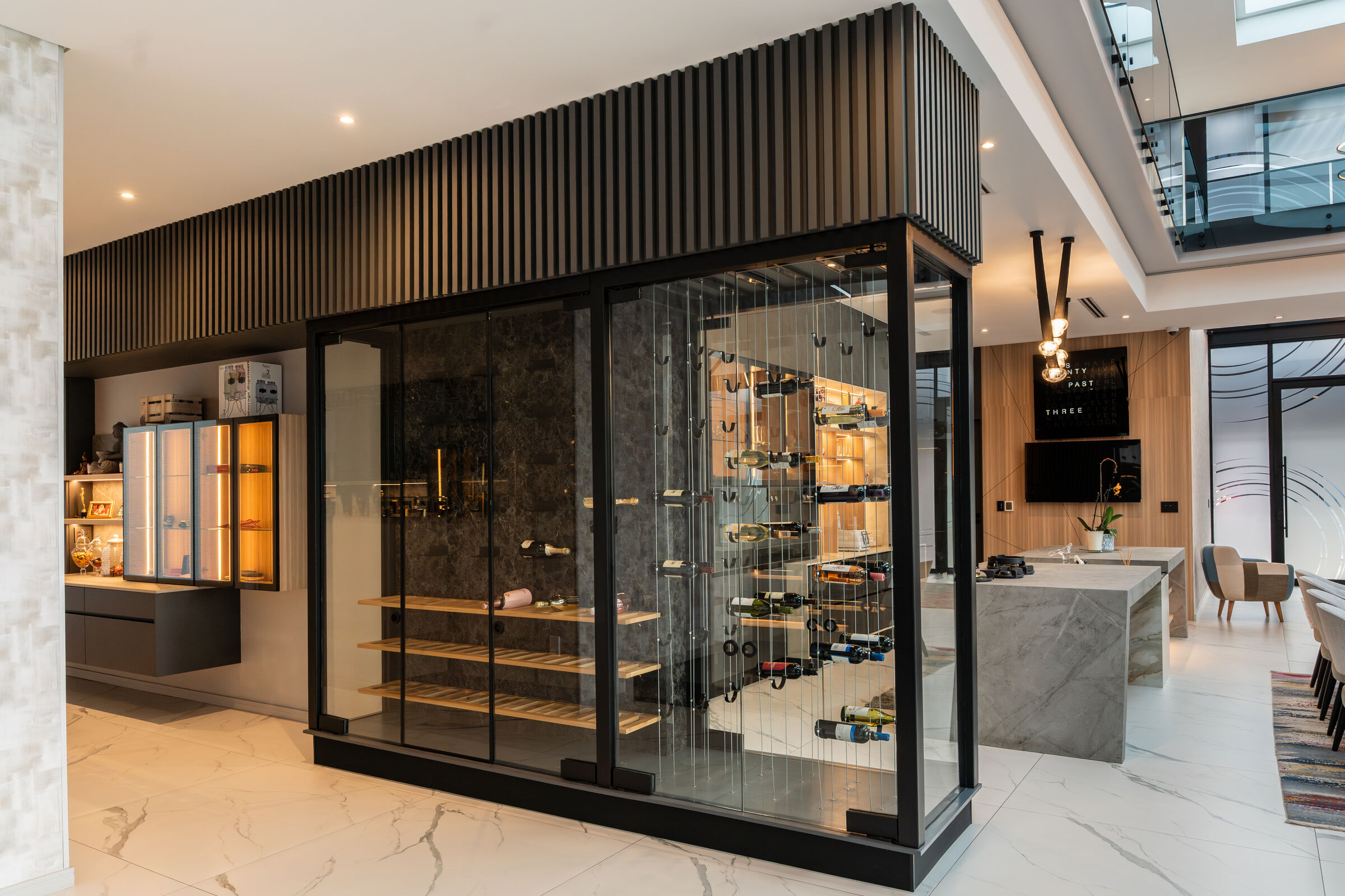 Steyn City Residence — glazed wine room, designed, manufactured and installed by The Kitchen Studio.