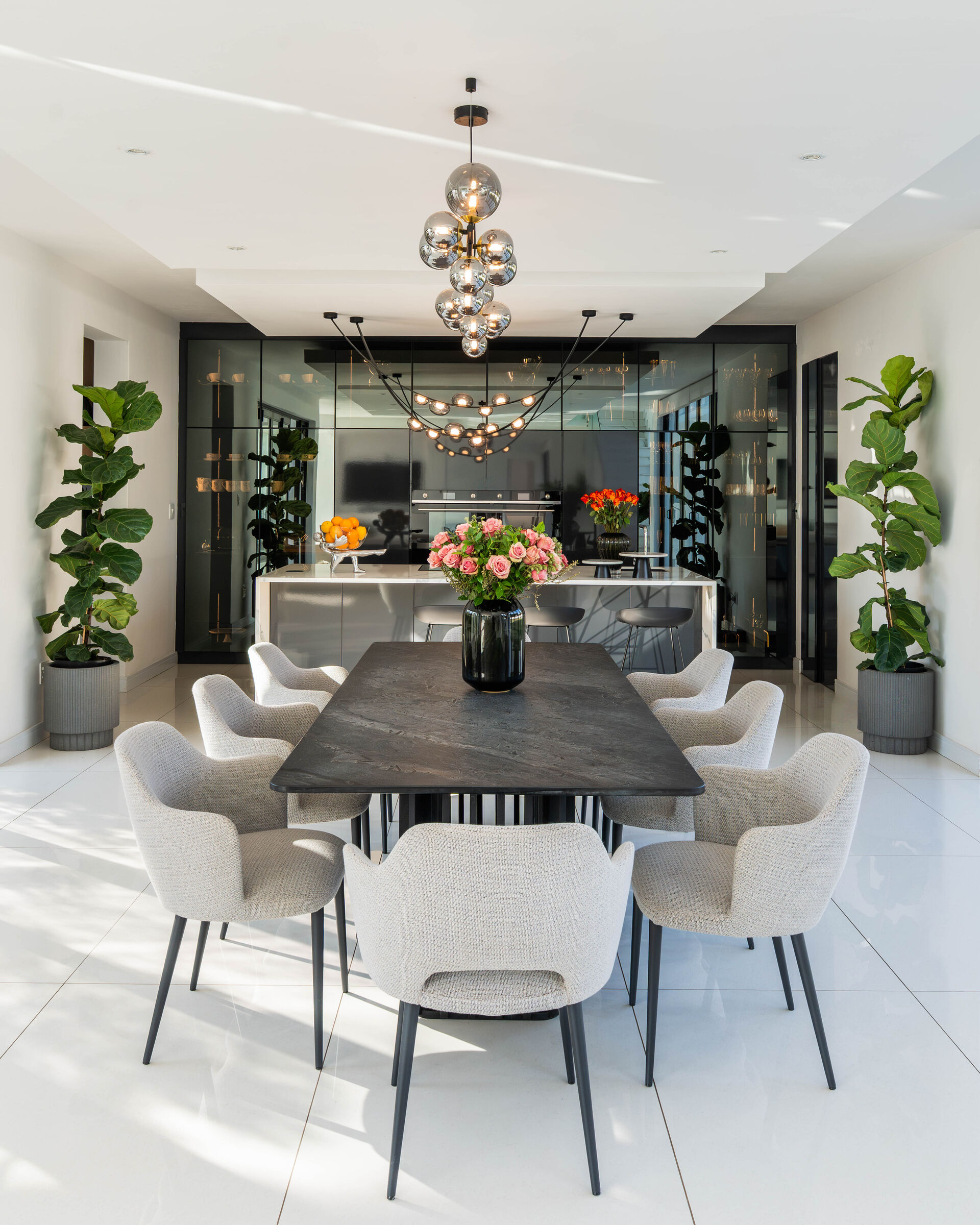 Hartbeespoort Residence — dining room with fitted joinery, designed, manufactured and installed by The Kitchen Studio.