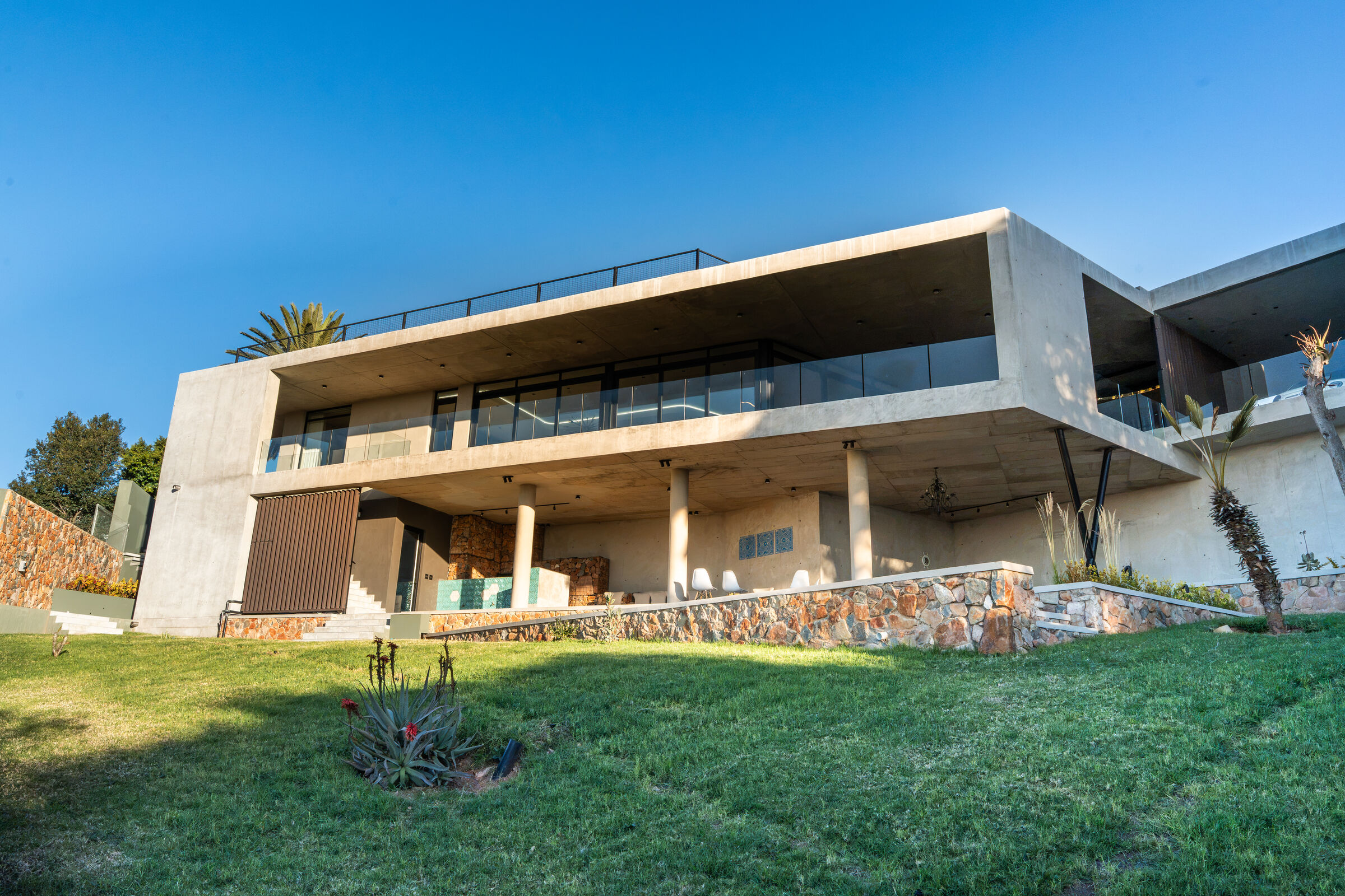 Northcliff Residence — the house seen from the garden, designed, manufactured and installed by The Kitchen Studio.