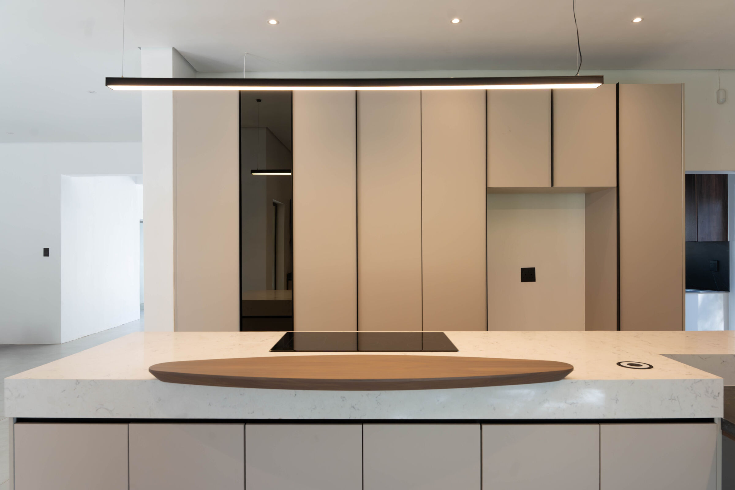 Greenside Residence — island with timber inset, designed, manufactured and installed by The Kitchen Studio.