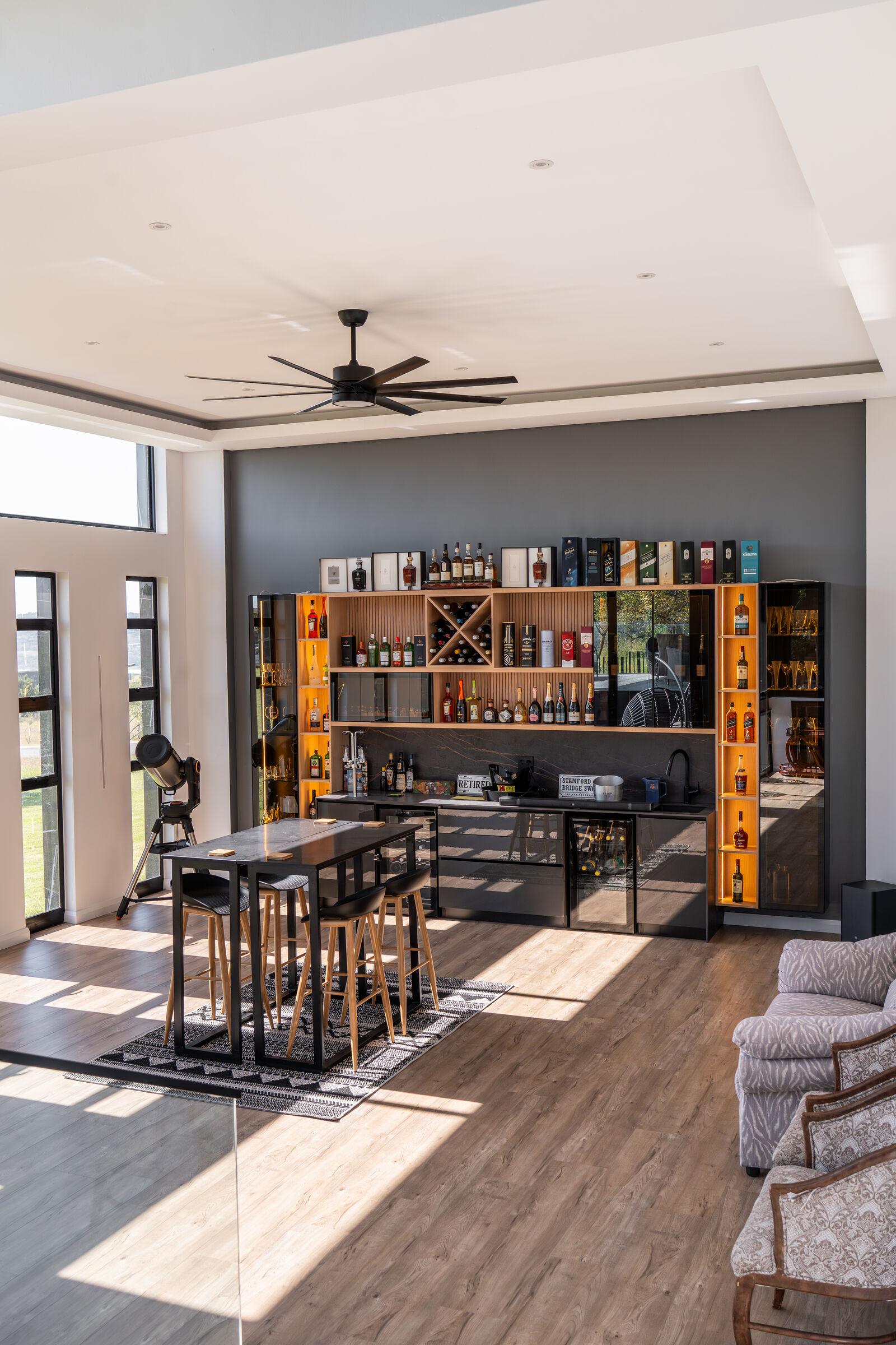 Steyn City Residence II — open bar to the living room, designed, manufactured and installed by The Kitchen Studio.