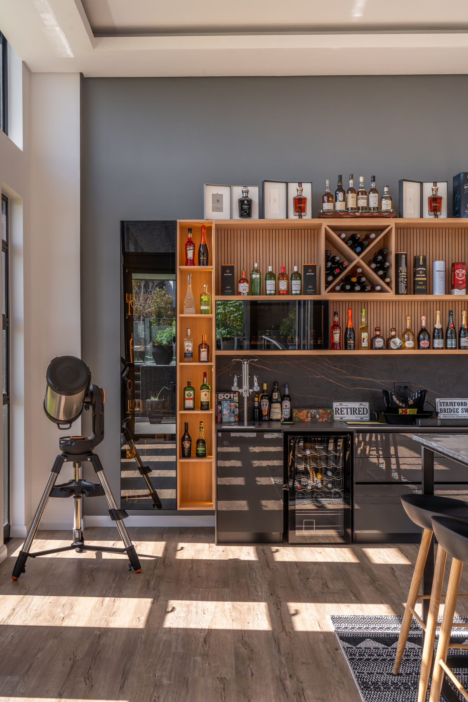 Steyn City Residence II — fitted bar and shelving, designed, manufactured and installed by The Kitchen Studio.