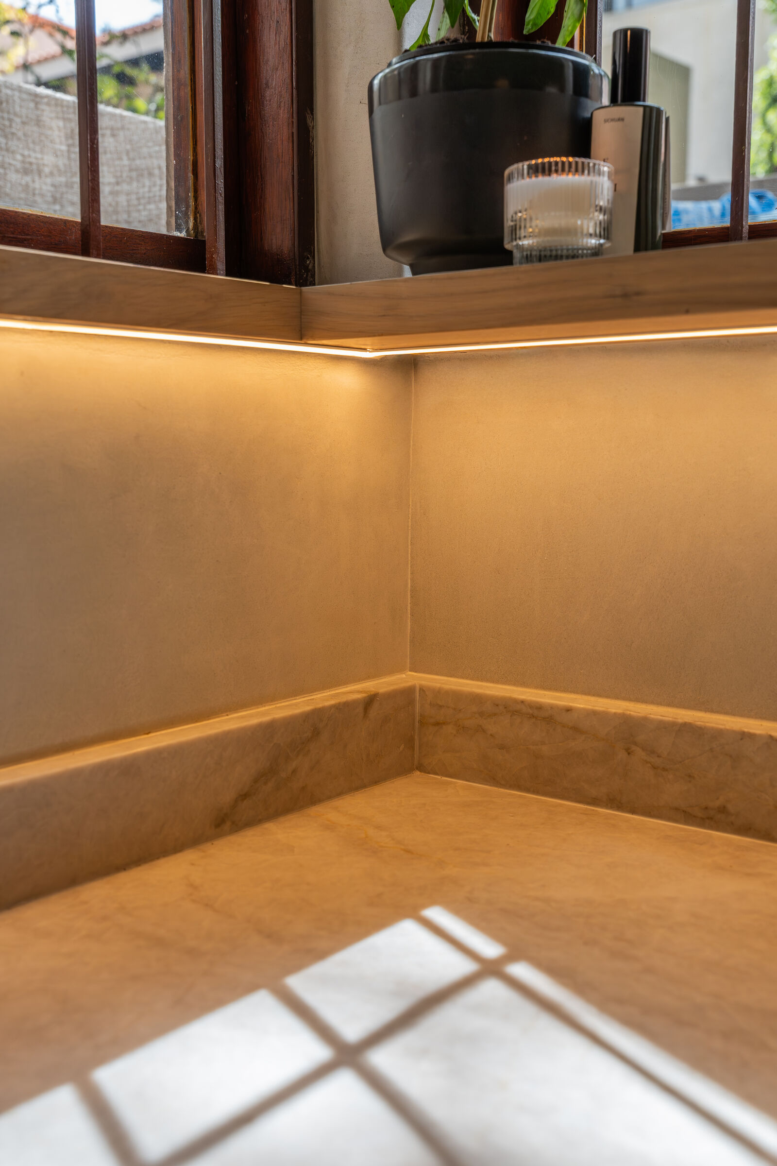 Bedford Park Residence — worktop and lighting detail, designed, manufactured and installed by The Kitchen Studio.