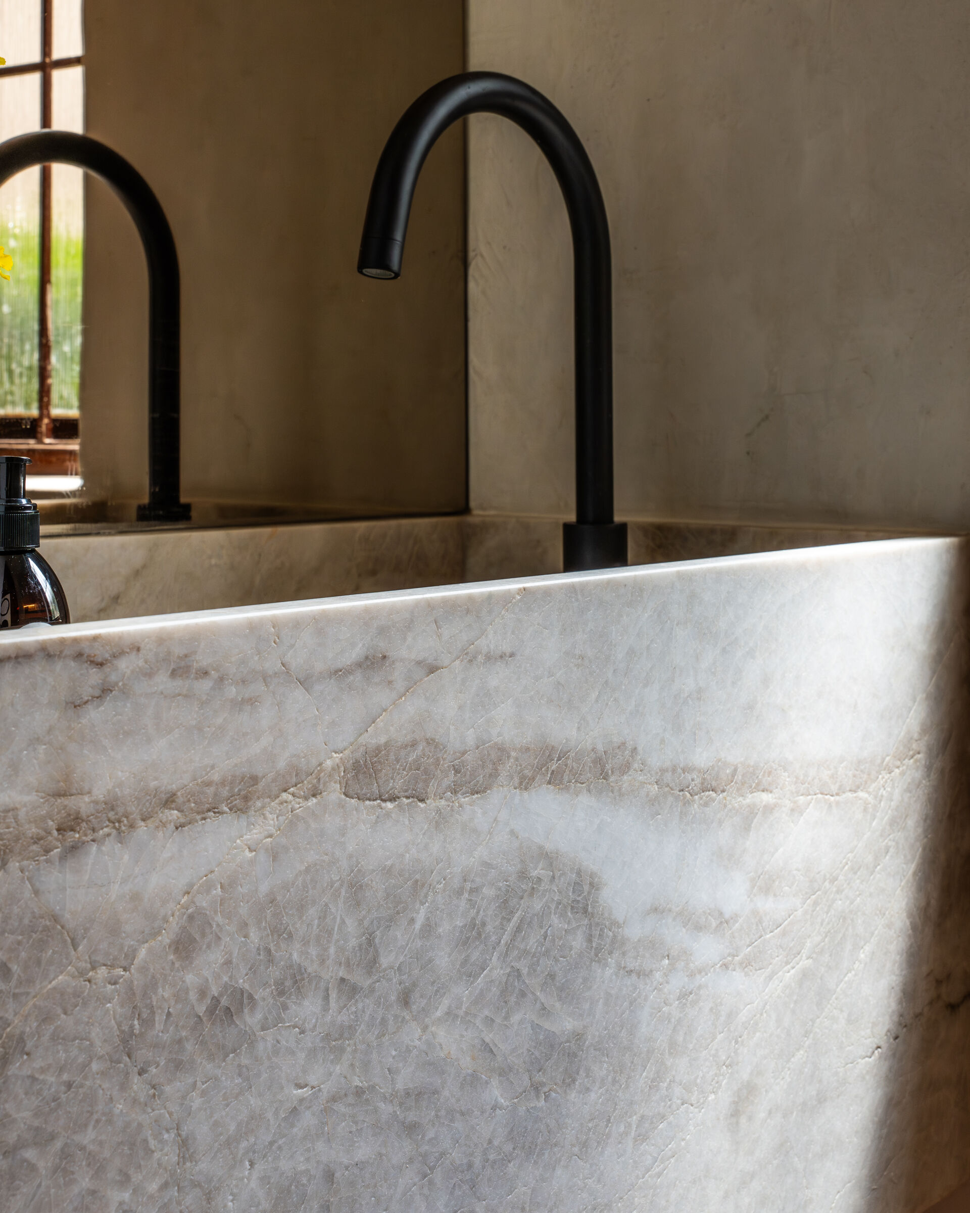Bedford Park Residence — stone basin and tap detail, designed, manufactured and installed by The Kitchen Studio.
