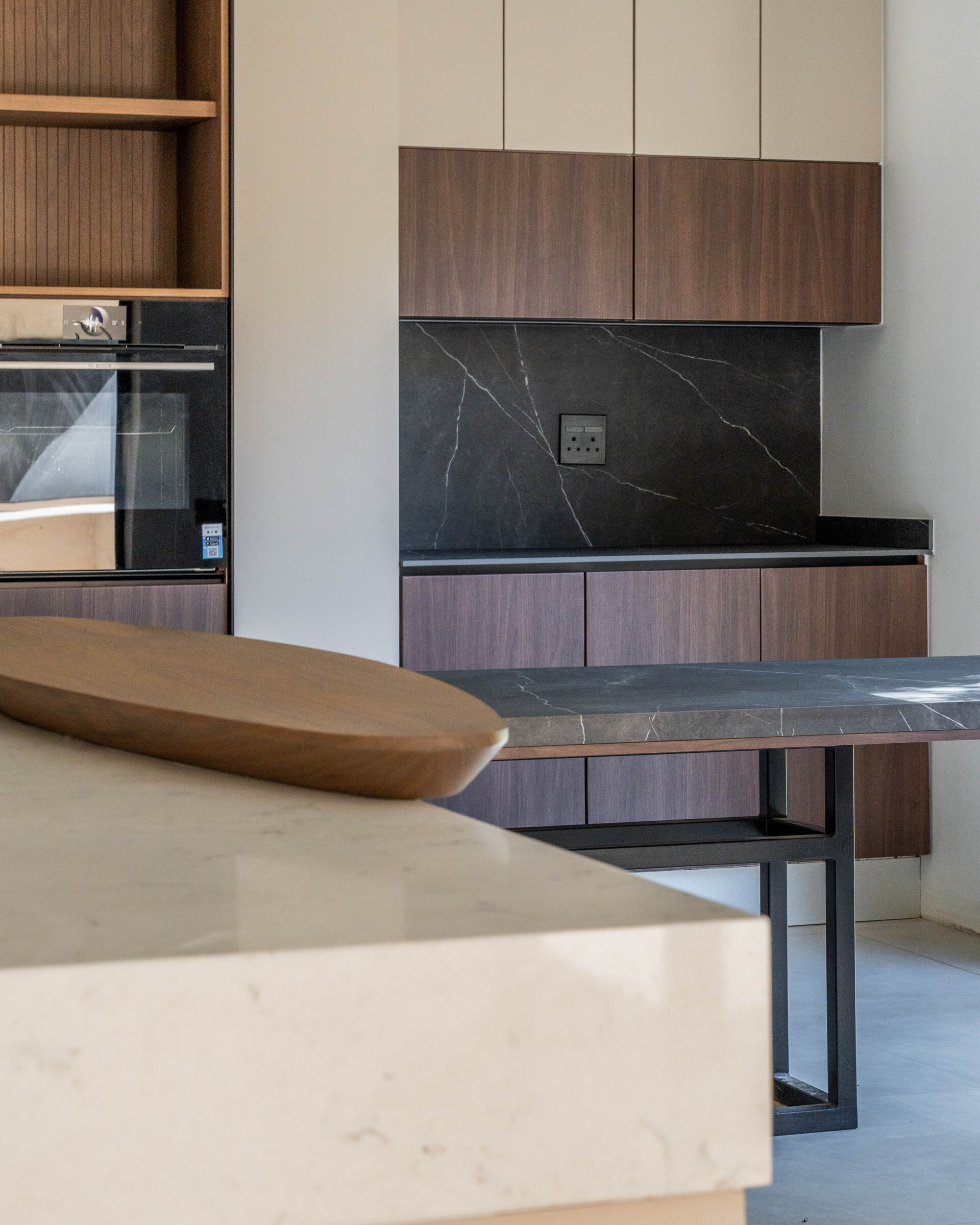Greenside Residence — island and stone worktop, designed, manufactured and installed by The Kitchen Studio.